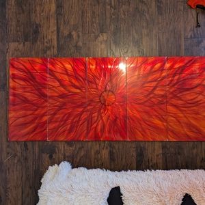 Red sunfire metal artwork